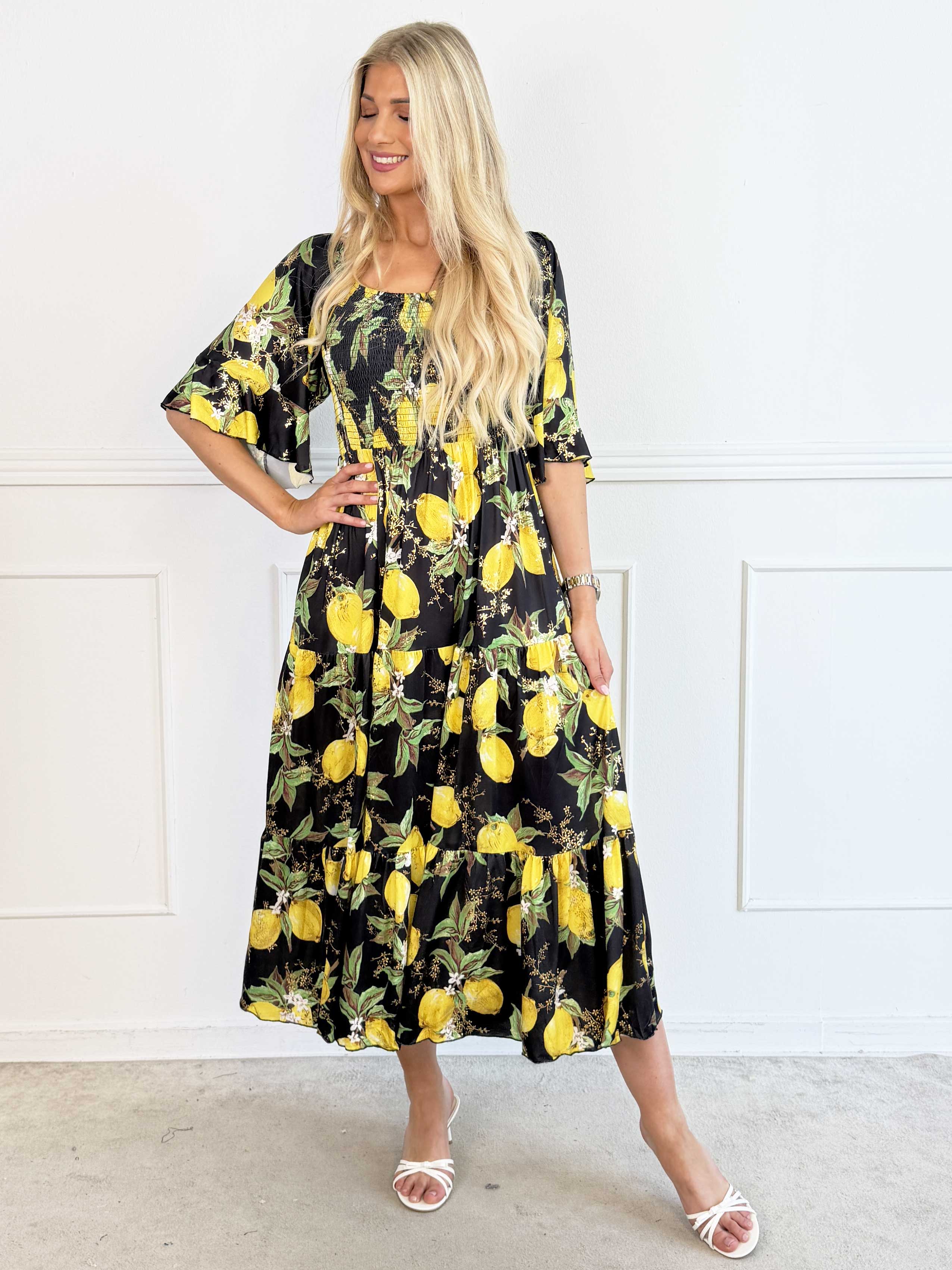 Elna Lemon - Lang elastisk kjole med citroner og smock over brystet